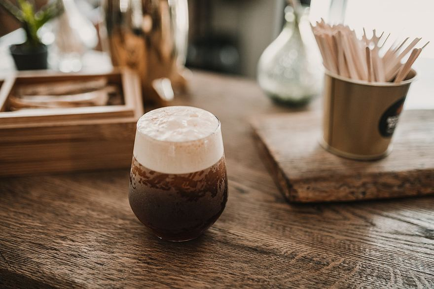 Nitro cold brew coffee with a cascading pour